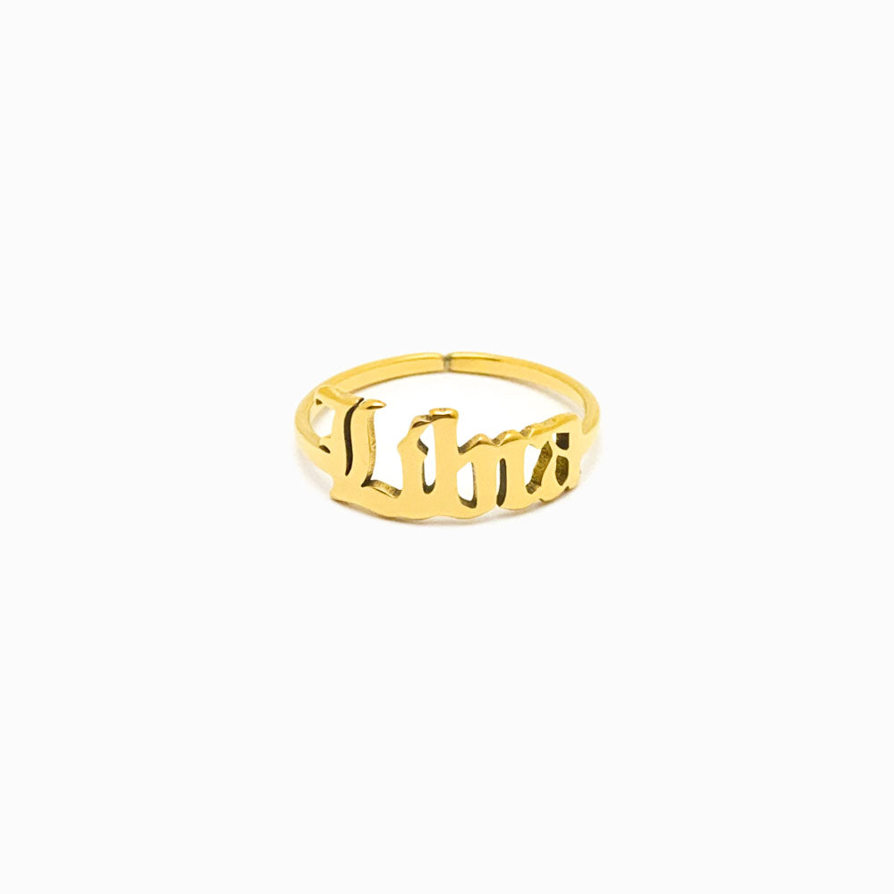Anel Signo de Aço Inox Dourado Libra