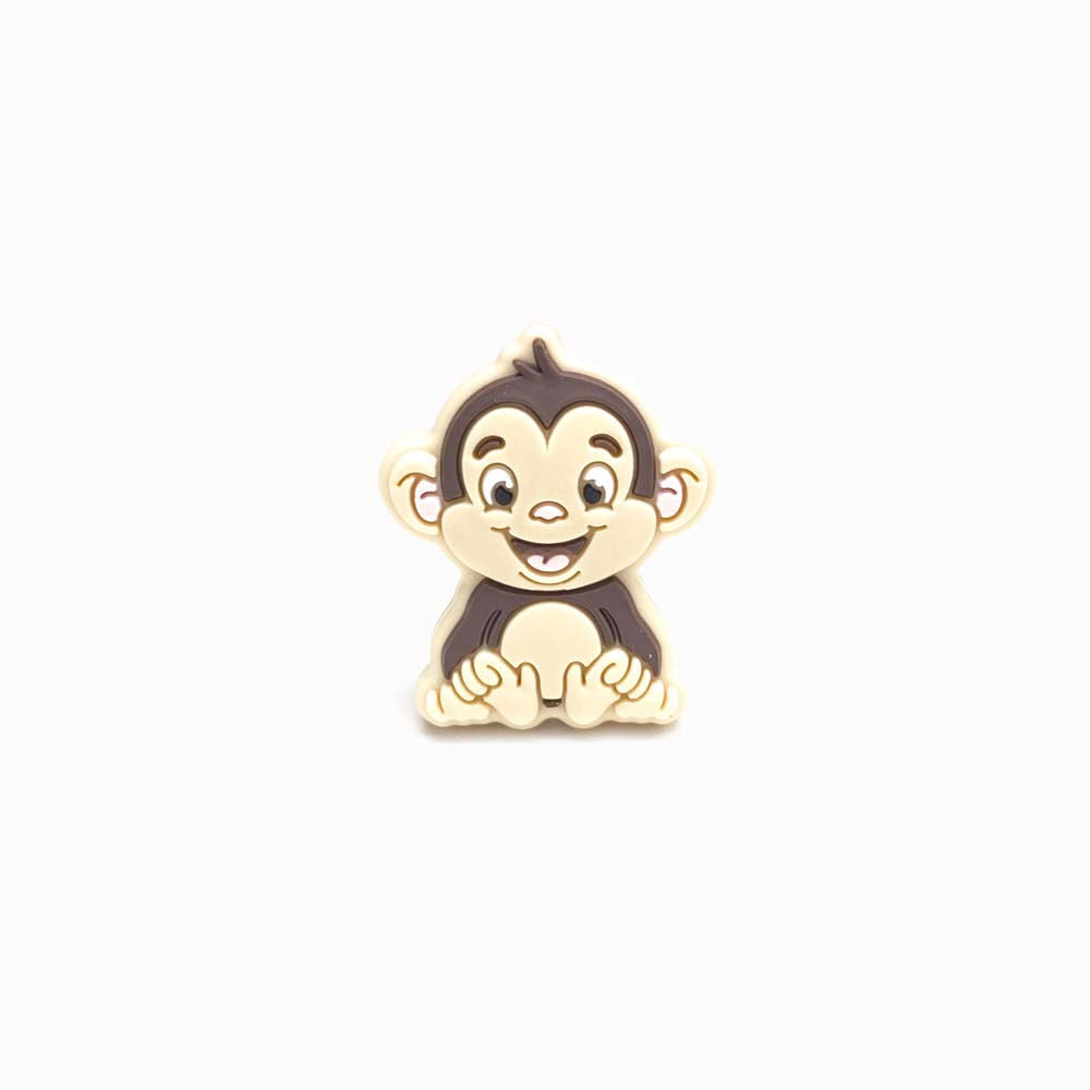 Contas de silicone para prendedor de chucha design macaco 30x24mm bege